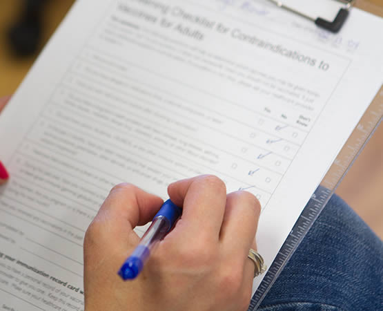 patient filling out forms